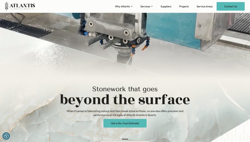 Atlantis Granite & Quartz website homepage with hero headline: Stonework that goes beyond the surface
